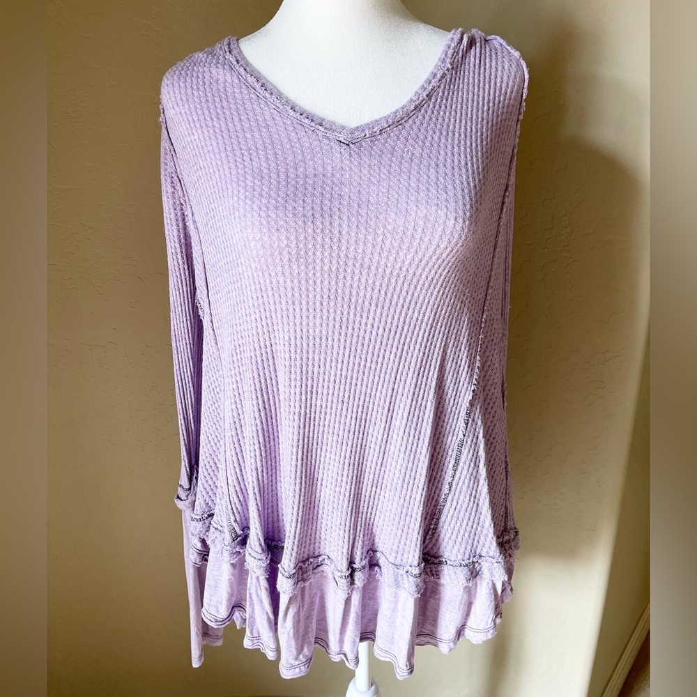 Free people blouse that is flowy.